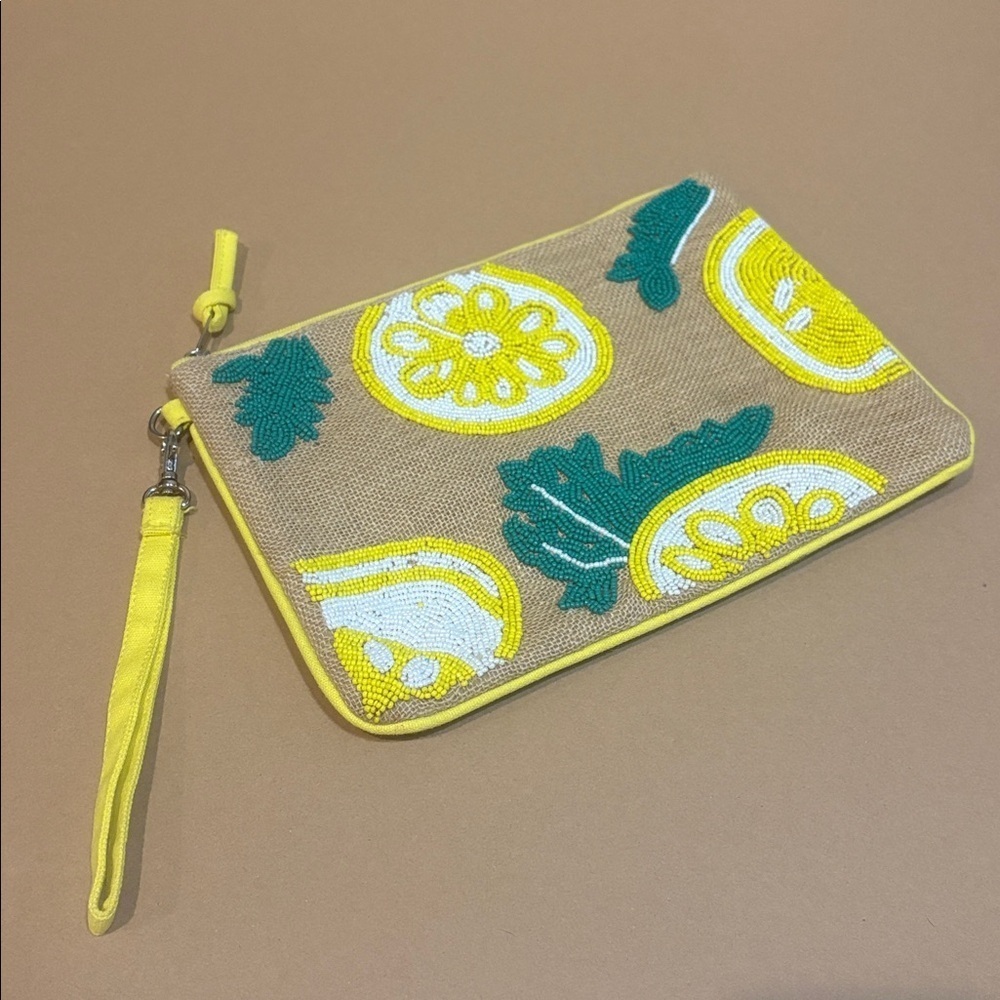 Francesca's Jute woven clutch with beaded lemons